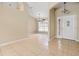 Bright foyer and dining area featuring tile flooring and an open floor plan design at 2645 Sw 148Th Ln, Ocala, FL 34473