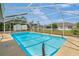 Enjoy swimming in this beautiful pool within a screened enclosure, enhanced by a spacious backyard at 2645 Sw 148Th Ln, Ocala, FL 34473