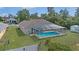 Enclosed in-ground pool in the backyard at 2645 Sw 148Th Ln, Ocala, FL 34473