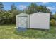 A two-section shed with a covered ramp at 2645 Sw 148Th Ln, Ocala, FL 34473