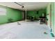 Unfinished basement with painted walls, utility connections, and an open layout, offering customization potential at 7072 Scruboak Ln, Orlando, FL 32818