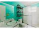 Vibrant bathroom with modern sink, toilet, and stand-up shower at 7072 Scruboak Ln, Orlando, FL 32818
