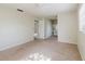 The spacious bedroom boasts a neutral palette and a private vanity/sink area at 7072 Scruboak Ln, Orlando, FL 32818