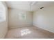 This bedroom features neutral-colored walls, carpeted floors, and ample natural light at 7072 Scruboak Ln, Orlando, FL 32818