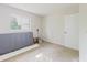 This bedroom features neutral colored walls, carpeted floors, and a window providing natural light at 7072 Scruboak Ln, Orlando, FL 32818