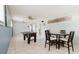 Spacious game room with tile flooring, ceiling fan, and foosball table for entertainment at 7072 Scruboak Ln, Orlando, FL 32818
