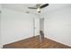 This bedroom features a ceiling fan and bathroom access at 1003 Edmund Ave, Dundee, FL 33838