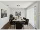 Elegant dining room with stylish table setting and decor is perfect for Gathering gatherings at 1003 Edmund Ave, Dundee, FL 33838