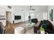Nicely furnished living room with modern accents, featuring stylish furniture and decor at 1003 Edmund Ave, Dundee, FL 33838