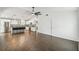 Spacious living room area connected to kitchen, featuring sleek tile flooring and ample natural light at 1003 Edmund Ave, Dundee, FL 33838