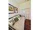 Charming bedroom featuring daybed, decorative pillows, and closet at 2613 Drew Cir, The Villages, FL 32163