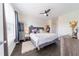 Inviting bedroom with a bed, gray headboard, and decor at 6133 Metrowest Blvd # 105, Orlando, FL 32835