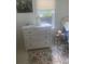 Bedroom with a white dresser and side table; well-lit by a window at 734 Maryland Ave, Winter Park, FL 32789