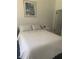 Bright bedroom with a comfortable bed and beautiful floral-themed decor throughout at 734 Maryland Ave, Winter Park, FL 32789