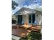 Charming home exterior with a spacious deck and awning, perfect for outdoor living and entertaining at 734 Maryland Ave, Winter Park, FL 32789