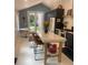 An open kitchen features modern cabinets, white countertops, and stainless steel appliances at 734 Maryland Ave, Winter Park, FL 32789