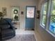 Inviting living room with bright, white walls and hardwood floors at 734 Maryland Ave, Winter Park, FL 32789