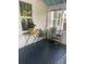 Cozy porch with seating area, plants, and natural light at 734 Maryland Ave, Winter Park, FL 32789