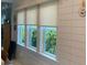 Bright window with roll-up blinds and outside view at 734 Maryland Ave, Winter Park, FL 32789