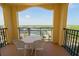 Charming balcony with outdoor furniture and views, creating a perfect spot for relaxation and enjoying fresh air at 8125 Resort Village Dr # 5902, Orlando, FL 32821