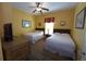 Inviting bedroom featuring two queen-sized beds, ample lighting, and comfortable furnishings, perfect for guests at 8125 Resort Village Dr # 5902, Orlando, FL 32821