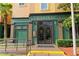 Entrance to Frankie Farrells showcases a traditional pub-style facade with dark green accents and decorative lighting at 8125 Resort Village Dr # 5902, Orlando, FL 32821