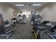 Bright, well-maintained fitness center featuring modern cardio equipment and weight machines for a complete workout experience at 8125 Resort Village Dr # 5902, Orlando, FL 32821