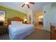 Bright main bedroom with ensuite bathroom featuring soaking tub, tile flooring and modern fixtures at 8125 Resort Village Dr # 5902, Orlando, FL 32821