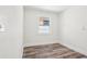 Cozy bedroom featuring clean lines and new paint with a window allowing natural light at 515 9Th St, Winter Garden, FL 34787