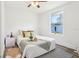 Inviting bedroom with natural light, a plush rug, and a comfortable bed at 515 9Th St, Winter Garden, FL 34787