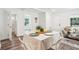 Cozy dining area with views to living room and bathroom at 515 9Th St, Winter Garden, FL 34787
