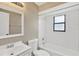 Bright bathroom featuring a vanity with sink and bathtub with tiled surround and shower at 562 Nardello Dr, Deltona, FL 32725