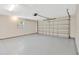 A spacious two car garage with epoxy flooring and an automatic door at 562 Nardello Dr, Deltona, FL 32725