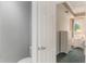 Bathroom featuring toilet, and view into the bedroom with dresser and a bed at 414 Long Cove Ct, Ormond Beach, FL 32174