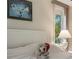 Cozy bedroom featuring a plush bed, soft lighting, and serene decor at 414 Long Cove Ct, Ormond Beach, FL 32174