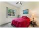 Bedroom featuring single bed, globe, and window at 414 Long Cove Ct, Ormond Beach, FL 32174