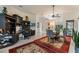 Open-concept living space with a built-in desk, dining area, and neutral color scheme perfect for entertaining at 414 Long Cove Ct, Ormond Beach, FL 32174