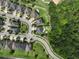 Aerial view of the neighborhood and the surrounding trees at 5095 Southlawn Ave, Orlando, FL 32811