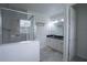 Bright bathroom with a glass shower and a double sink vanity at 5095 Southlawn Ave, Orlando, FL 32811