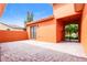 Charming patio with brick pavers, access to a cozy outdoor area and access to the backyard and garden at 154 Indian Wells Ave, Kissimmee, FL 34759
