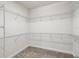 Spacious walk-in closet providing substantial wire shelving and storage solutions at 1553 Amber Leaf Cir, Ocoee, FL 34761