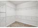Walk-in closet with ample storage space and wire shelving at 1553 Amber Leaf Cir, Ocoee, FL 34761