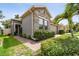 Attractive single-story home with manicured lawn, stone accents, and well-maintained landscaping at 1553 Amber Leaf Cir, Ocoee, FL 34761