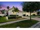 Charming single-story home with manicured lawn and inviting curb appeal at 1553 Amber Leaf Cir, Ocoee, FL 34761