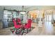 Elegant dining room with modern furnishings and an open view to the kitchen at 17567 Se 81St Parnassus Ct, The Villages, FL 32162