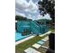 Backyard showing a blue painted deck with stairs and gazebo, perfect for outdoor entertaining at 3439 Swindell Rd, Lakeland, FL 33810