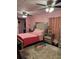 Inviting bedroom with pink walls, decorative rug, and stylish decor at 3439 Swindell Rd, Lakeland, FL 33810