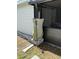 Exterior featuring a rain barrel under the gutter spout, emphasizing eco-friendly features of the home at 3439 Swindell Rd, Lakeland, FL 33810