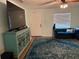 Bright living room with a blue accent rug and a comfortable sofa at 3439 Swindell Rd, Lakeland, FL 33810