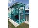 Poolside bar area painted in a vibrant turquoise color, perfect for outdoor gatherings at 3439 Swindell Rd, Lakeland, FL 33810